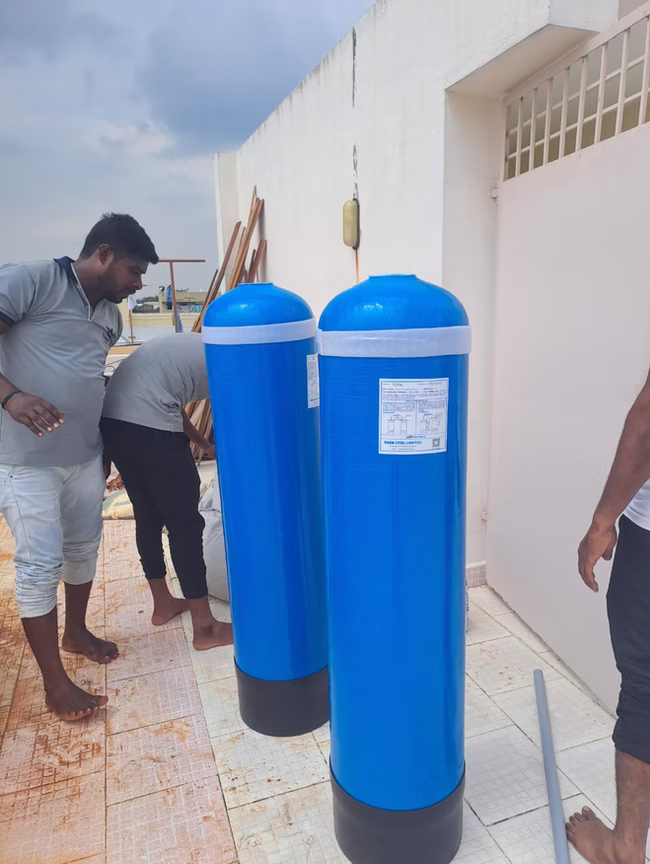 Technicians inspecting a completed installation
