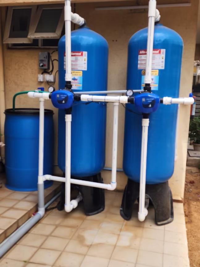 Twin-tank water treatment system installed on a terrace